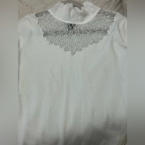 White turtleneck sweater